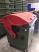 Wheelie Plastic Bin with Dome Lid in Red